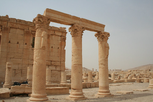 Palmyra - columns with integral statues in N. courtyard of Temple of Baal-Shamin